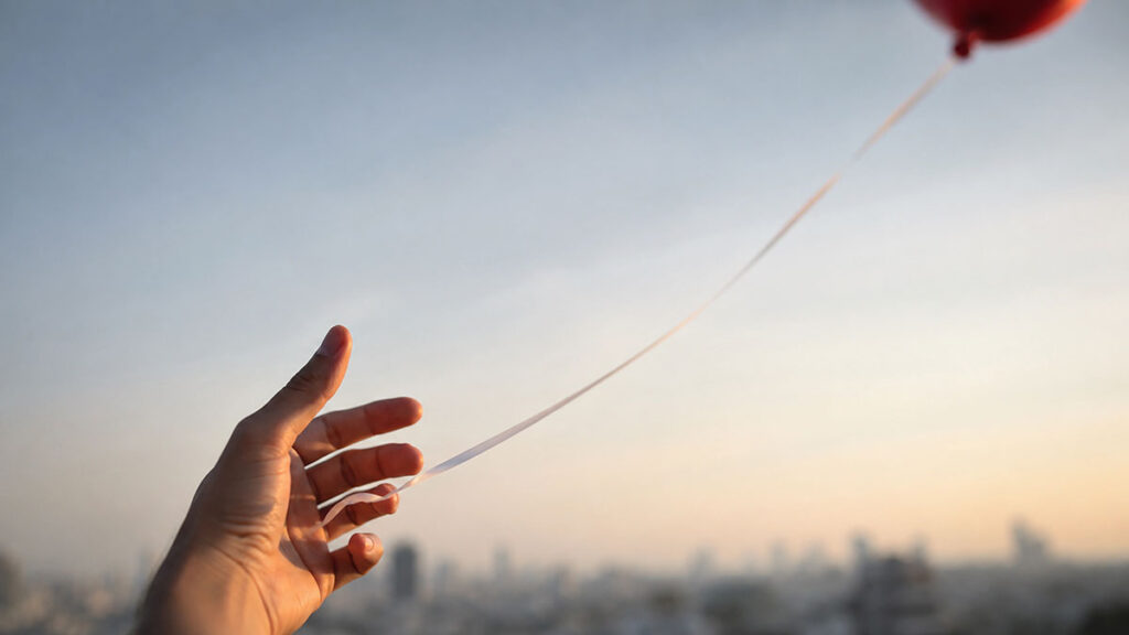 letting go of balloon